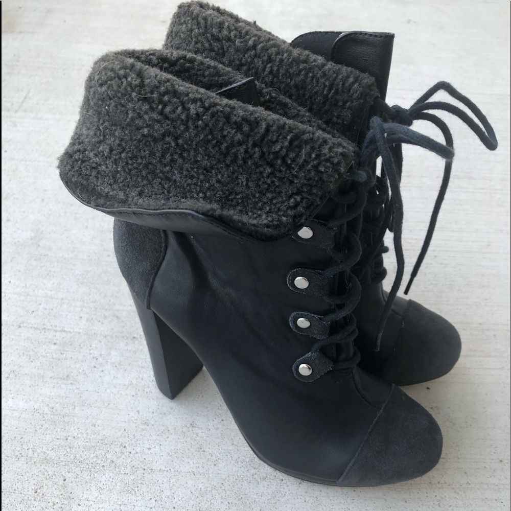 Victoria’s Secret black leather lace up booties.